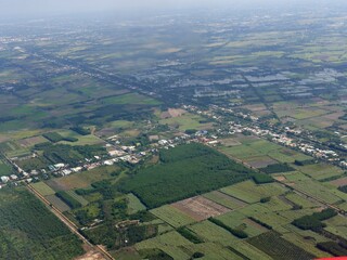 Aerial view of farmland and buildings in rural area of Texas.
