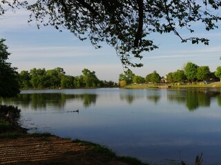 Scenic lakeside view with the clouds reflected in the waters