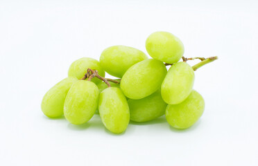 fresh whole Green bunch, cluster or group of Thompson table seedless grapes, isolated on white...