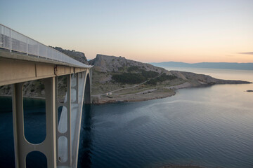 Part of the bridge connecting the mainland and the island of the KRK and the sea. The bridge...