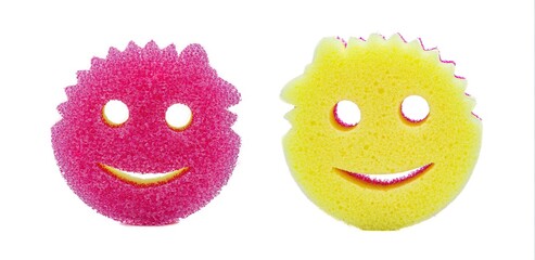 Ocala, Florida January 26, 2024 Scrub Mommy and Daddy eponymous sponges in the shape of a smiley face made from a strong high tech polymer, on display isolated on white background  dual both sides