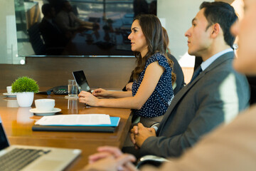 Group of businesspeople attending a meeting