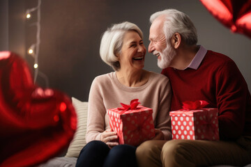 Obraz na płótnie Canvas Senior mature married couple celebrating Valentine day