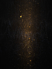 Glittering snow particles abstract background. Snowflakes fly in the air illuminated by the sun.