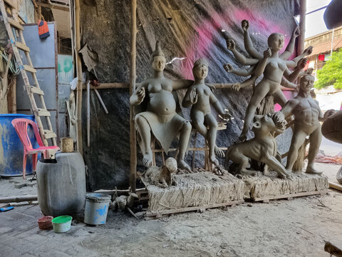 Kolkata, West Bengal, India- September 20 2019: Making of clay sculpture of Hindu Goddess Durga also known as Maa Durga for bengal's biggest celebration Durga Puja Utsav