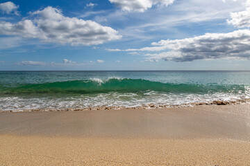 The sandy beach at Porthcurno in Cornwall, on a sunny September day
