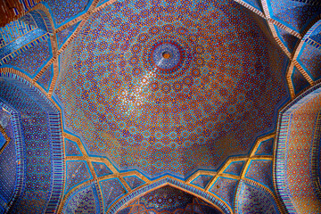 Beautiful traditional ceiling, mosaic of golden, blue and orange colors in Shah Jahan Mosque in Thatta, Pakistan. Also known as Jamia Masjid of Thatta. 