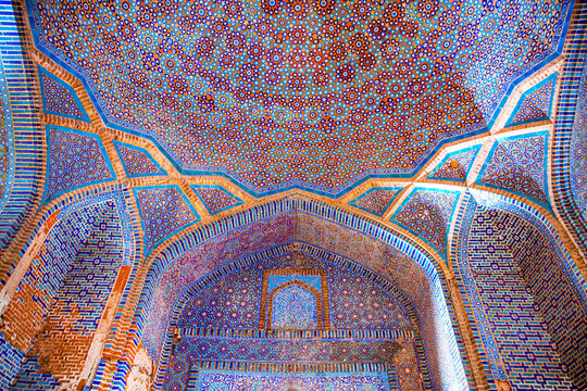 Beautiful traditional ceiling, mosaic of golden, blue and orange colors in Shah Jahan Mosque in Thatta, Pakistan. Also known as Jamia Masjid of Thatta. 
