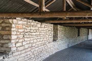 Pskov, Russia, September 6, 2024. Fragment of a covered gallery on the fortress wall.