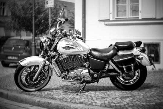 WERDER (HAVEL), GERMANY - MAY 20, 2023: The cruiser-type motorcycle Honda Shadow 750 Ace. Swirl bokeh, art lens. Black and white. Oldtimer - Festival Werder Classics 2023