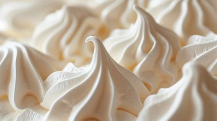 Papier Peint photo Photographie macro Macro shot of soft, white meringue swirls with selective focus