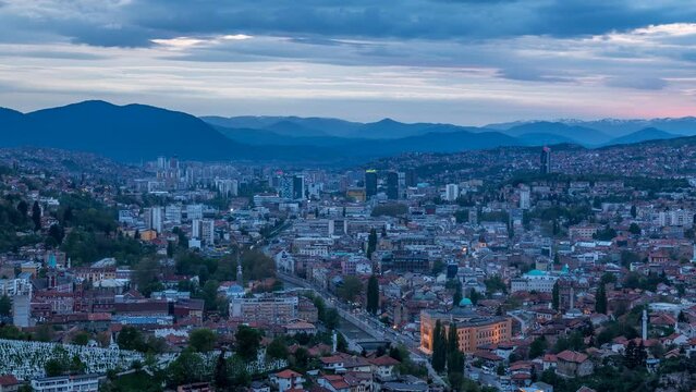 Sarajevo city skyline aerial view time lapse footage from day to night bosnia and herzegovina.