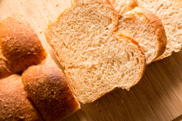 Sliced white Bread on the bamboo desk background, homemade bakery concept