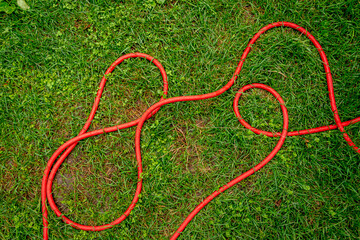 Tire tracks in the green grass.