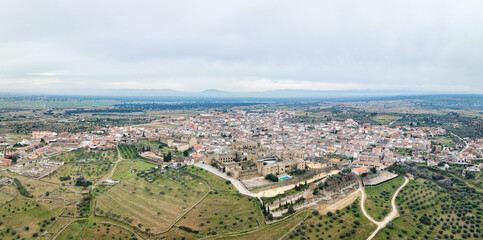 Aerial view of the Spanish town of Oropesa in Toledo, with its famous Parador in the foreground. - 721536906