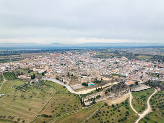 Aerial view of the Spanish town of Oropesa in Toledo, with its famous Parador in the foreground. - 721536908
