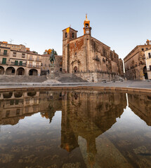 San Martin church in the beautiful Renaissance Plaza Mayor square in Trujillo, Extremadura. - 721536987