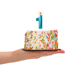 1 shaped candle light on happy birthday cake isolated on white background