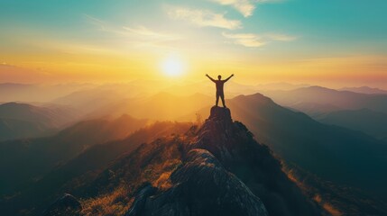 Copy space of man rise hand up on top of mountain and sunset sky abstract background. Freedom and travel adventure concept. - obrazy, fototapety, plakaty