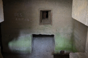 Surveillance window through which the Nazi German soldier from the Second World War watches the entrance to the bunker
