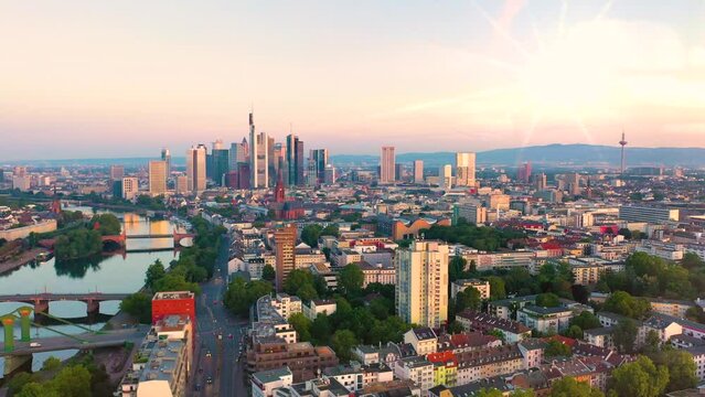 Frankfurt am main germany aerial skyline view fly over city downtown in fornt frankufrt am main germany skyscrapers and on left frankfurt old town fly over bridge and river frankfurt panorama.