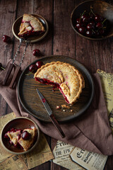 Cherry pie on dark brown background 