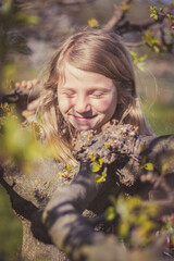 portrait of child in spring nature, relaxing and having good time