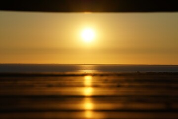 Framed sunset into sea.