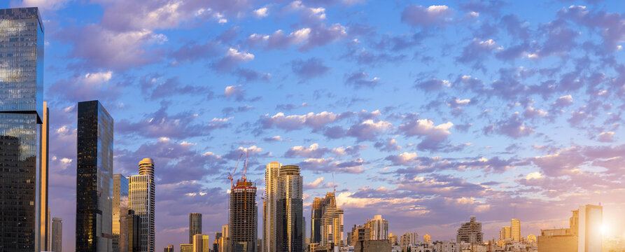 Israel, Tel Aviv financial business district skyline with shopping malls and high tech offices at sunset