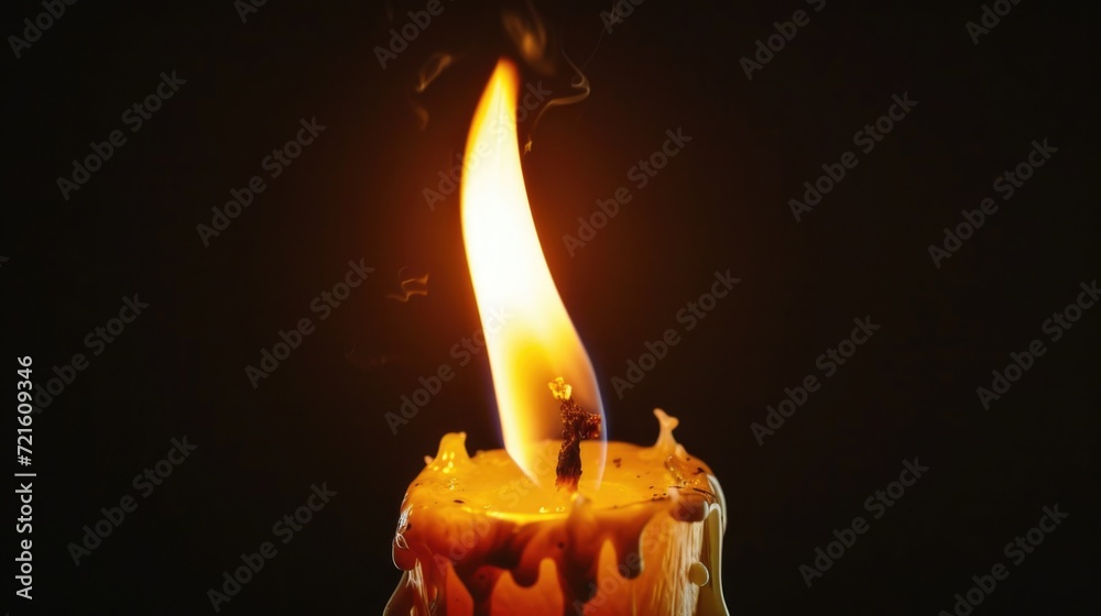 Aufkleber A lit candle with smoke emanating from it. Perfect for creating a cozy and atmospheric ambiance.