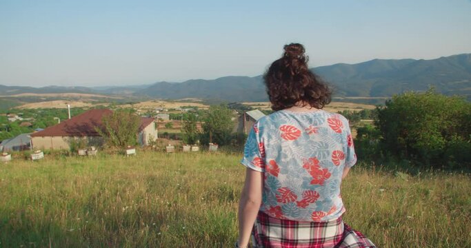 Girl walking on a village path