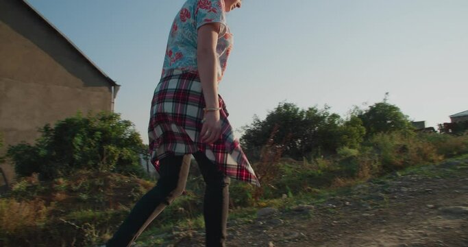Girl walking on a village path