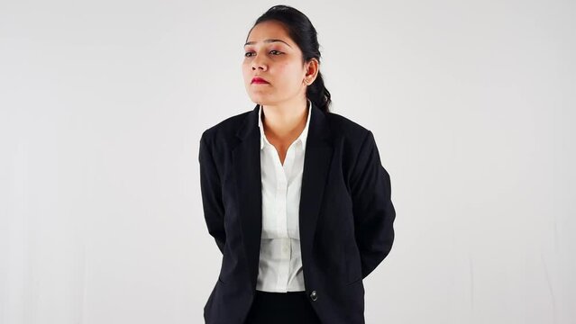 Professional woman in business attire looking concerned or thoughtful on a white background
