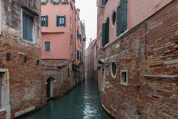 Fototapeta na wymiar Small canals in Venice, Italy