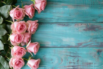 Rustic Charm: Pink Roses Arrangement with Teal Wooden Background and Copy Space