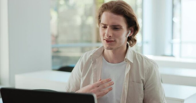 Laptop, internet and video call with employee man in office for webinar, virtual meeting or online training. Business, computer and networking with young person at workplace for technology discussion