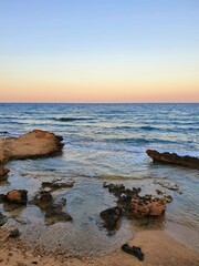 Beautiful sunset on the rocky beach
