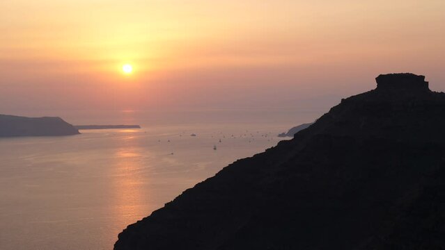 Sunset Above the Sea at the Santorini Caldera in Summer