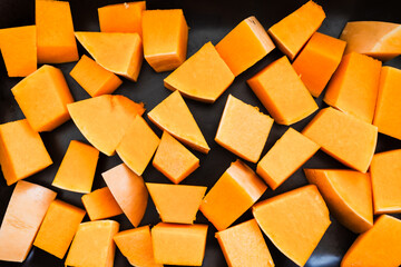diced up butternut squash on oven tray
