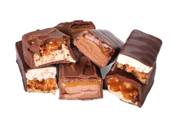 Pieces of tasty chocolate bars with nougat and nuts on white background