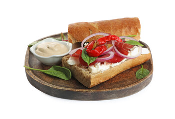 Delicious sandwich with bresaola, cream cheese, chili pepper and sauce isolated on white