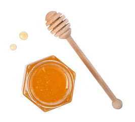 Tasty honey in glass jar and dipper isolated on white, top view. Space for text