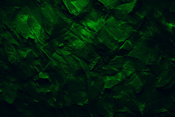 Green neon stone background banner wallpaper design. Dark rock grunge texture. Mountain surface close-up cracked empty copy space