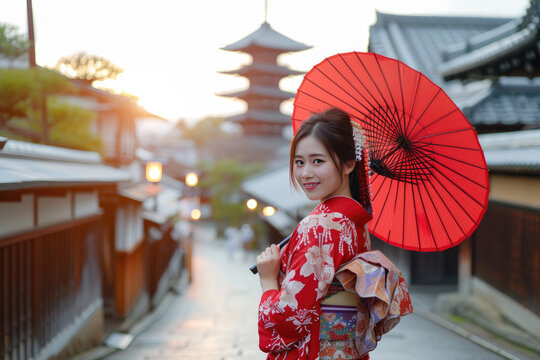 Asian woman wearing japanese traditional kimono at Yasaka Pagoda and Sannen Zaka Street in Kyoto, Japan