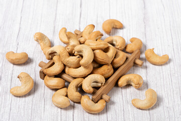 roasted salted cashew nuts on table.