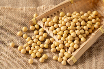 Dried soybeans seeds on table.