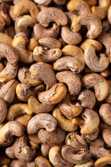 roasted salted cashew nuts texture background.