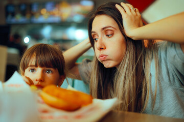 Desperate Mom Watching her Kid Eating only Fast food Meals. Worried mom overthinking her kid eating...