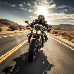 Dynamic shot of a motorcyclist on an open road. 