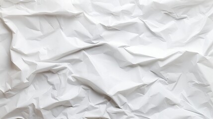 Obraz premium Crumpled white paper texture background - top view, abstract textured surface for creative design projects